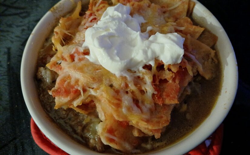 Pork and Green Chili Stew with a Chilaquiles Topper